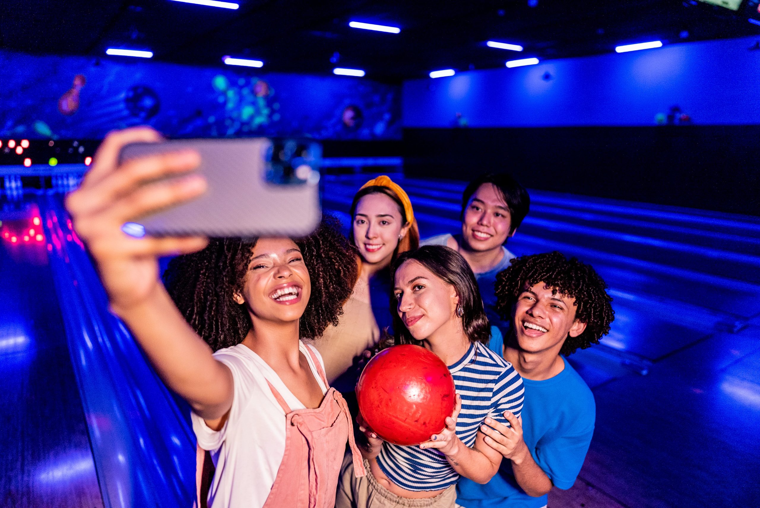 Friends taking a selfie at the bowling alley